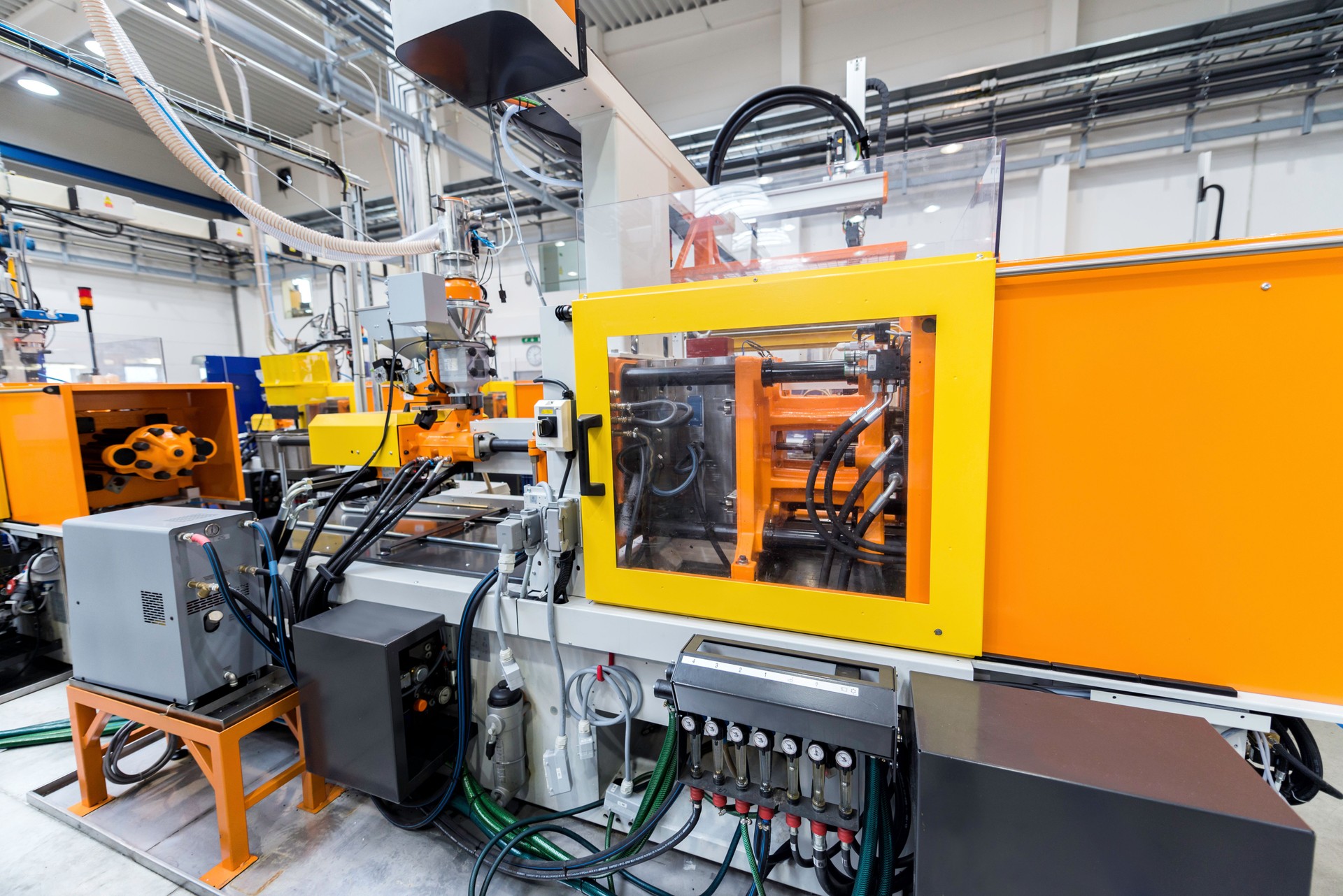 Injection molding machine in factory