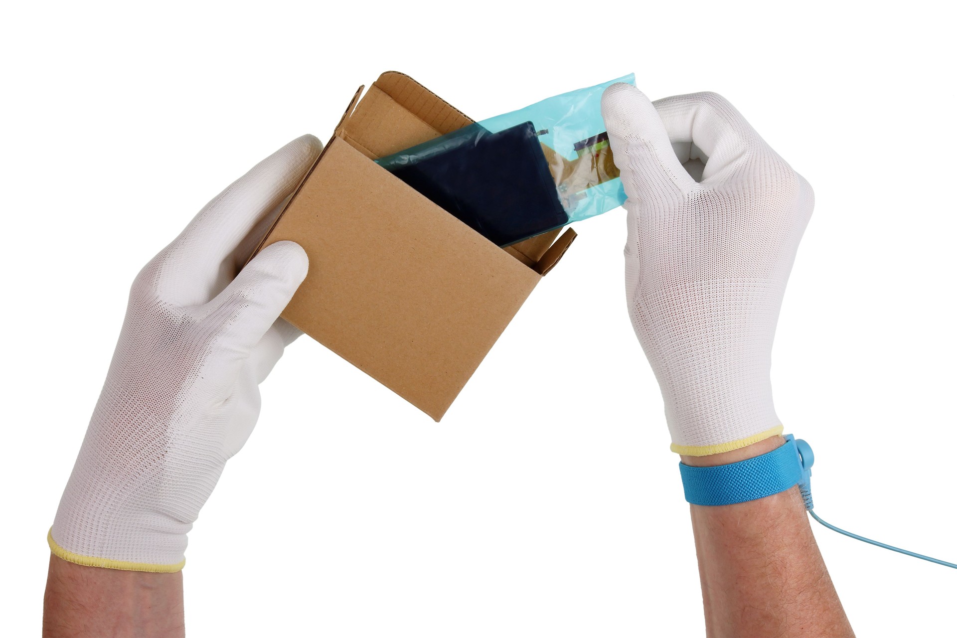 A technician in antistatic gloves unpacks from box the display to repair a modern digital camera